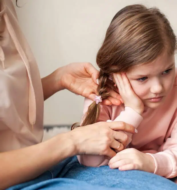 young girl with ear infection